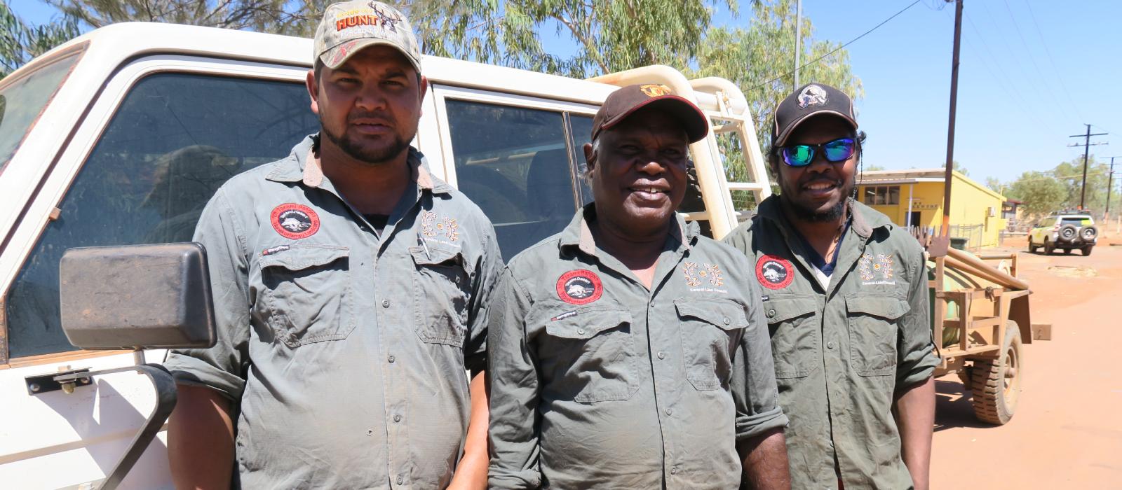 3 rangers smiling at camera